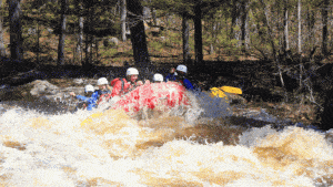 Whitewater rafting on the Peshtigo River over Horse Race Rapids