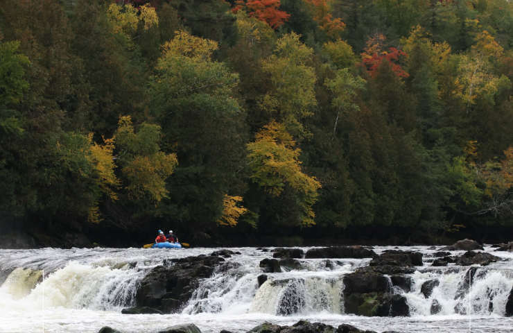 Waterfall with rafting