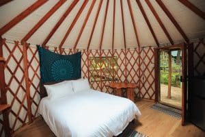 Don't compromise comfort! Stay in the queen size bed in the yurt beneath the skylight.
