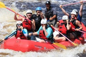 Group whitewater rafting on the Menominee River with Wildman guides