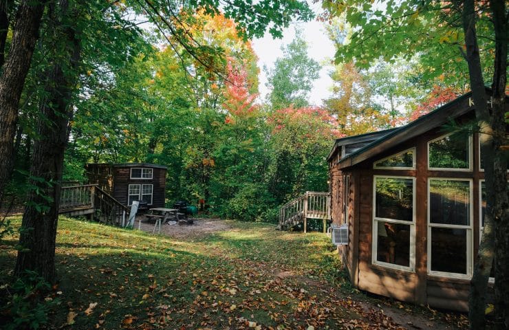 Two cabins on the banks of the Menominee River