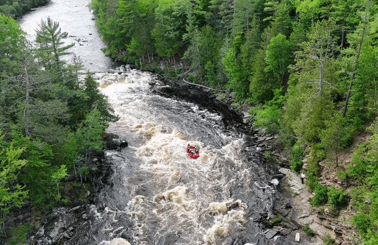 a whitewater raft in the Menominee River, viewed from above