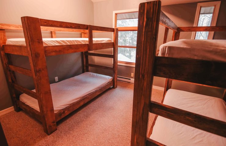 Peshtigo Lodge bunk room with 2 sets of bunk beds.
